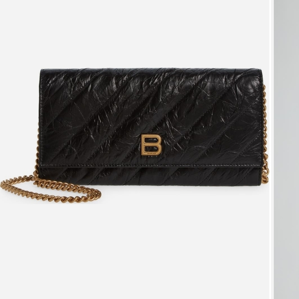 Balenciaga Black Quilted Clutch with Gold Chain.